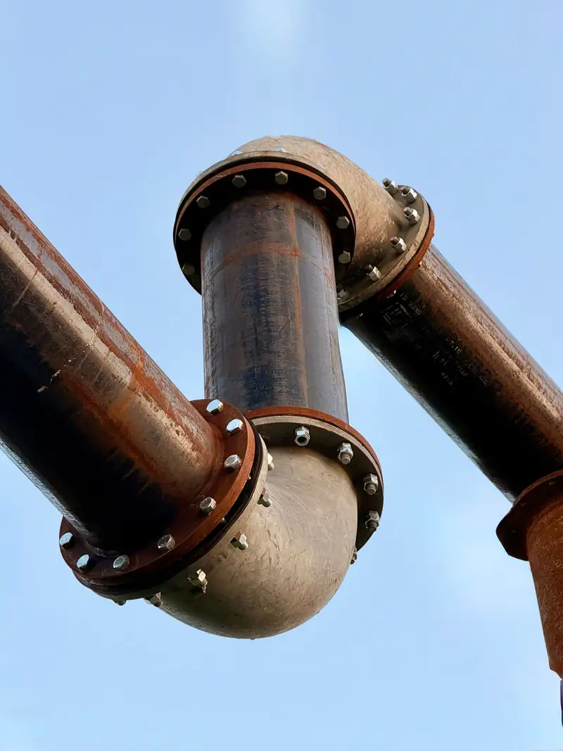 Rusted pipes joined with bolted flanges